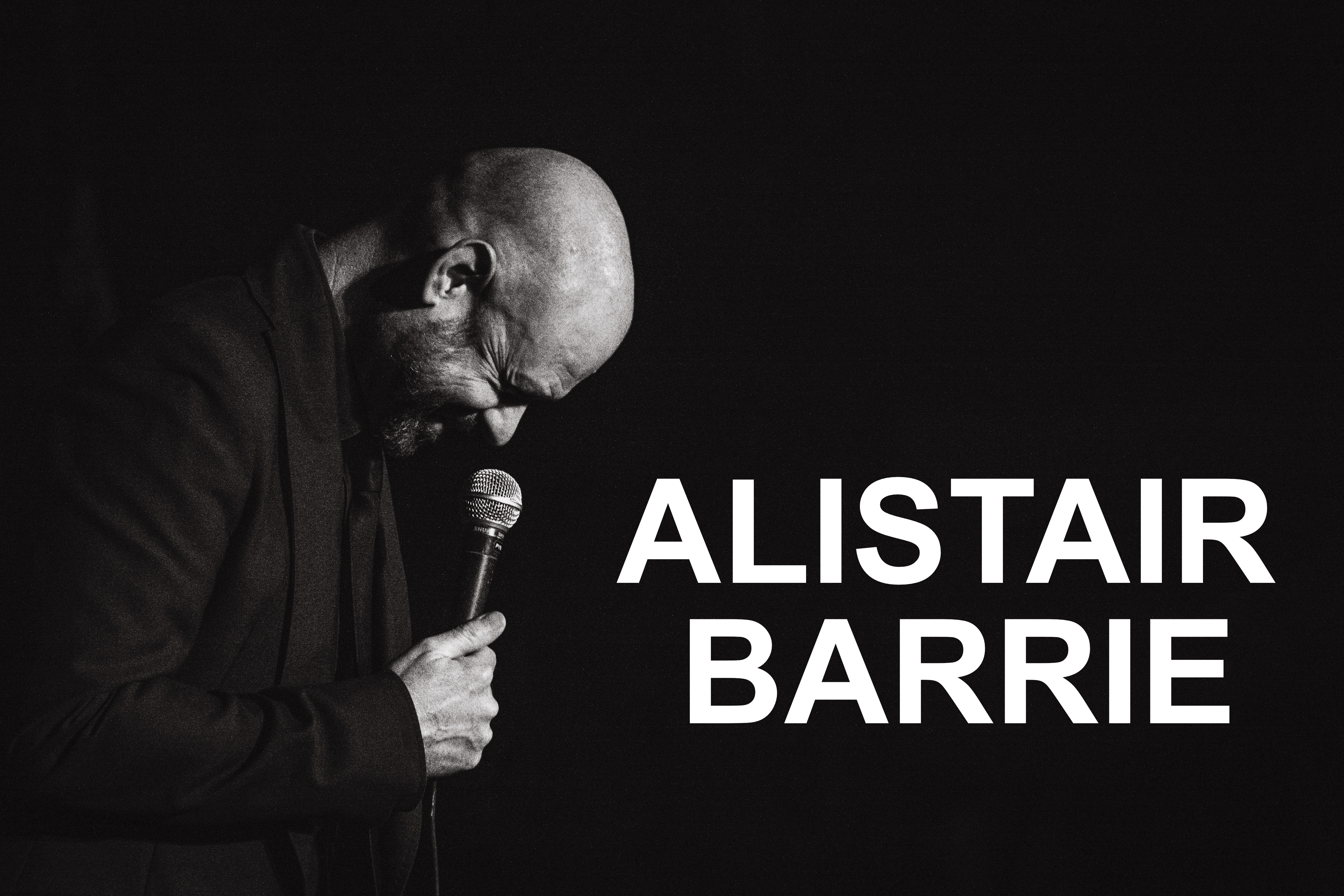 Alistair with microphone